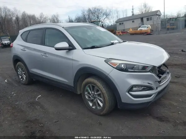 KM8J3CA40GU119874 2016 HYUNDAI TUCSON - Image 1