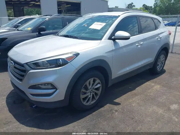 KM8J3CA40GU123598 2016 HYUNDAI TUCSON - Image 2
