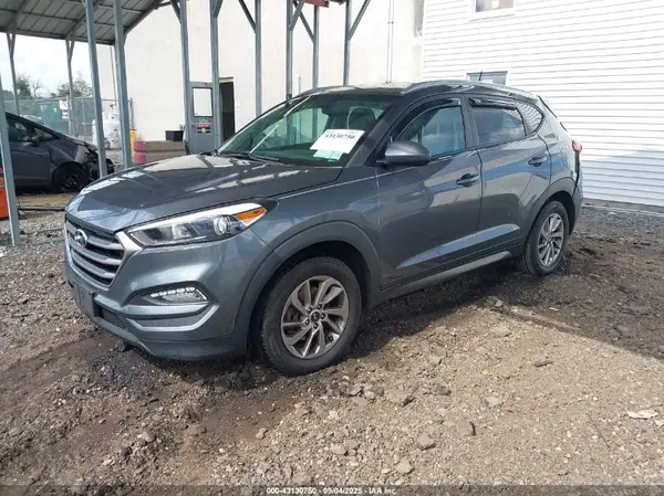 KM8J3CA40GU126243 2016 HYUNDAI TUCSON - Image 2