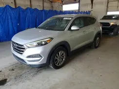 KM8J3CA40GU138733 2016 HYUNDAI TUCSON