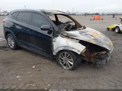 KM8J3CA40GU199404 2016 HYUNDAI TUCSON