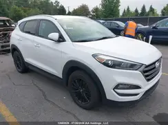 KM8J3CA40GU212636 2016 HYUNDAI TUCSON