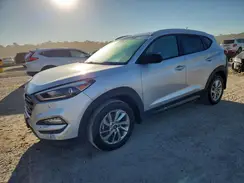 KM8J3CA40GU223877 2016 HYUNDAI TUCSON