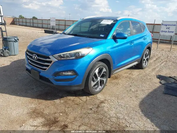 KM8J3CA40HU272563 2017 HYUNDAI TUCSON - Image 2