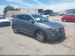 KM8J3CA40HU296281 2017 HYUNDAI TUCSON