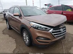 KM8J3CA40HU302001 2017 HYUNDAI TUCSON