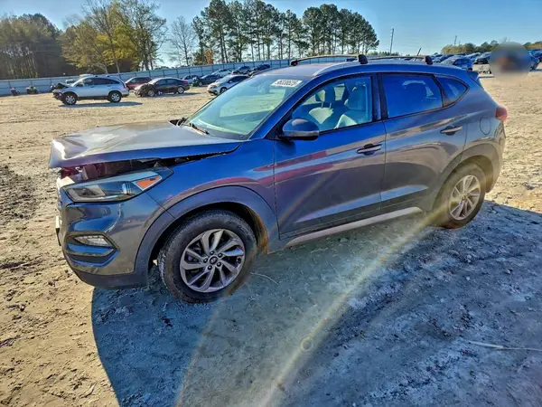 KM8J3CA40HU302418 2017 HYUNDAI TUCSON - Image 1