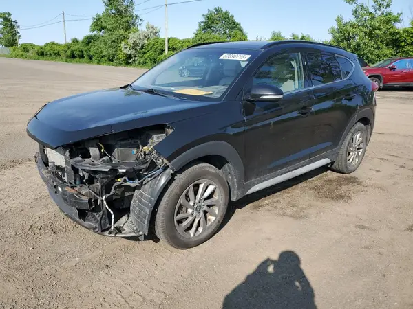 KM8J3CA40HU424017 2017 HYUNDAI TUCSON - Image 1