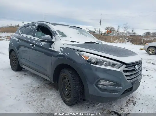 KM8J3CA40HU495539 2017 HYUNDAI TUCSON - Image 1