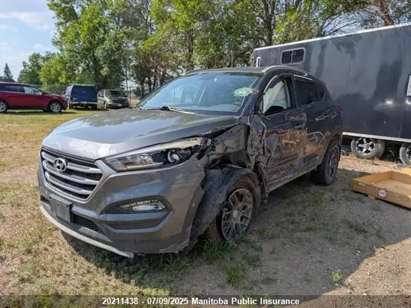 KM8J3CA40HU524182 2017 HYUNDAI TUCSON - Image 2