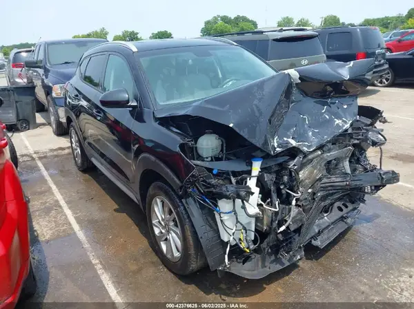 KM8J3CA40HU541869 2017 HYUNDAI TUCSON - Image 1