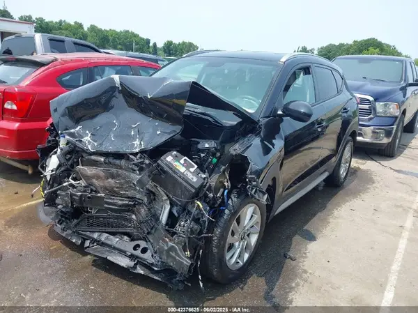KM8J3CA40HU541869 2017 HYUNDAI TUCSON - Image 2