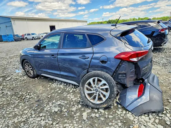 KM8J3CA40HU575228 2017 HYUNDAI TUCSON - Image 2