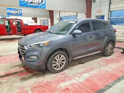 KM8J3CA40HU585807 2017 HYUNDAI TUCSON