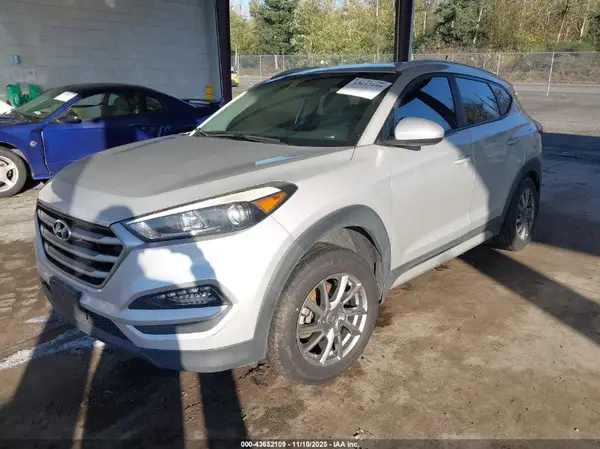 KM8J3CA40HU592370 2017 HYUNDAI TUCSON - Image 2