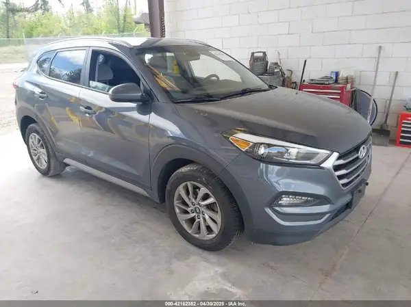 KM8J3CA40JU659247 2018 HYUNDAI TUCSON - Image 1