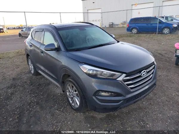 KM8J3CA40JU766203 2018 HYUNDAI TUCSON - Image 1
