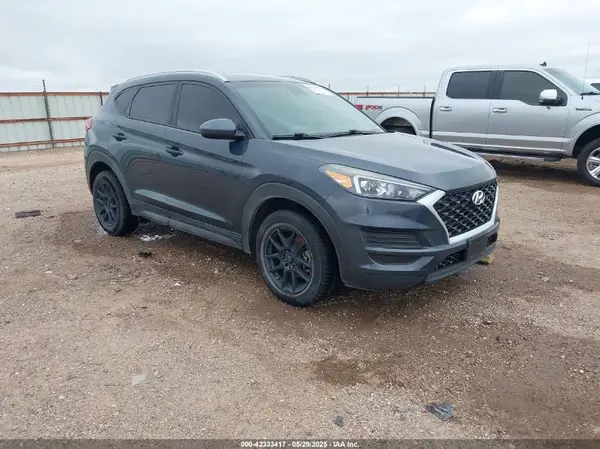KM8J3CA40KU984658 2019 HYUNDAI TUCSON - Image 1