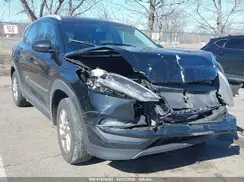 KM8J3CA41GU133962 2016 HYUNDAI TUCSON