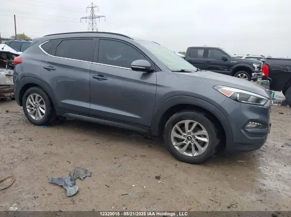 KM8J3CA41GU164662 2016 HYUNDAI TUCSON - Image 1
