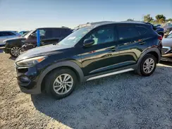 KM8J3CA41HU287802 2017 HYUNDAI TUCSON