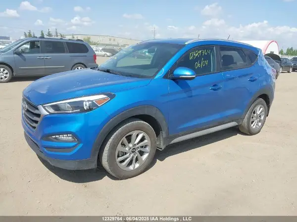 KM8J3CA41HU583113 2017 HYUNDAI TUCSON - Image 2