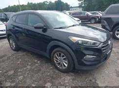 KM8J3CA42GU076056 2016 HYUNDAI TUCSON