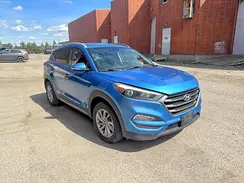 KM8J3CA42GU083136 2016 HYUNDAI TUCSON