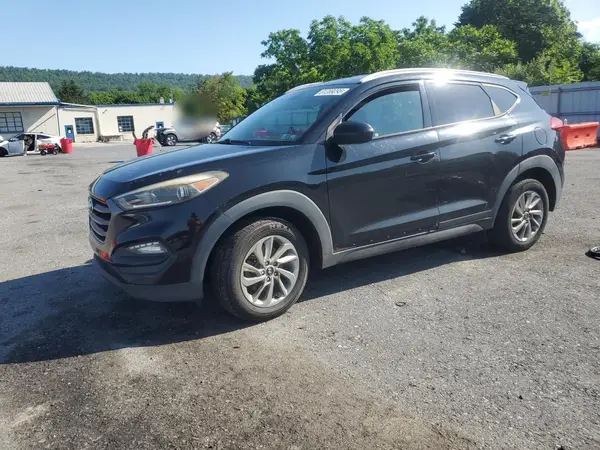 KM8J3CA42GU090815 2016 HYUNDAI TUCSON - Image 1