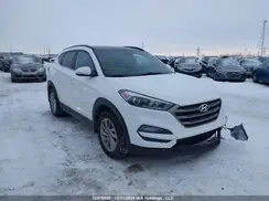 KM8J3CA42GU107404 2016 HYUNDAI TUCSON