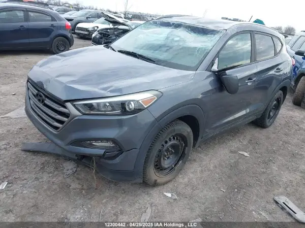 KM8J3CA42GU149233 2016 HYUNDAI TUCSON - Image 2