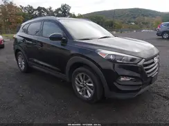 KM8J3CA42GU168767 2016 HYUNDAI TUCSON