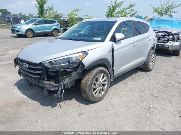 KM8J3CA42GU204098 2016 HYUNDAI TUCSON - Image 2