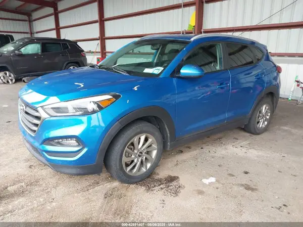KM8J3CA42GU224724 2016 HYUNDAI TUCSON - Image 2
