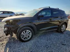 KM8J3CA42GU256153 2016 HYUNDAI TUCSON