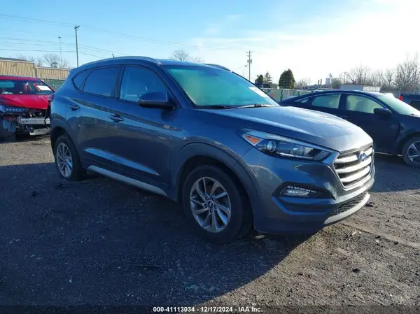 KM8J3CA42HU338434 2017 HYUNDAI TUCSON - Image 1