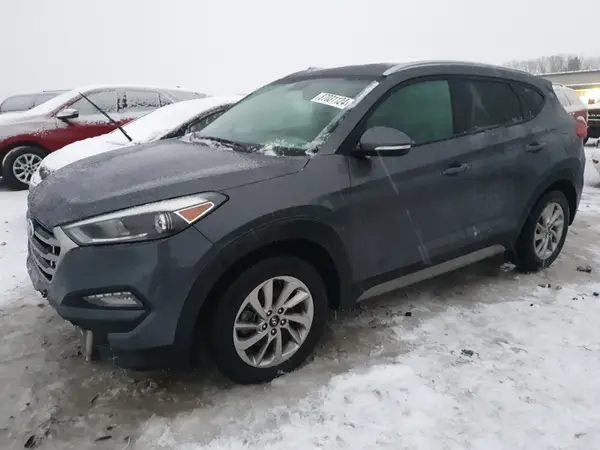 KM8J3CA42HU404657 2017 HYUNDAI TUCSON - Image 1