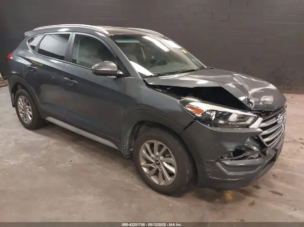 KM8J3CA42HU425184 2017 HYUNDAI TUCSON - Image 1