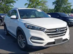 KM8J3CA42JU609451 2018 HYUNDAI TUCSON