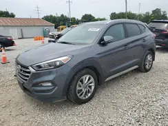 KM8J3CA42JU777154 2018 HYUNDAI TUCSON