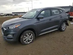 KM8J3CA42KU047911 2019 HYUNDAI TUCSON