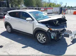 KM8J3CA42KU056818 2019 HYUNDAI TUCSON