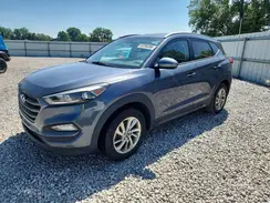 KM8J3CA43GU058424 2016 HYUNDAI TUCSON