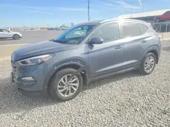 KM8J3CA43GU084909 2016 HYUNDAI TUCSON