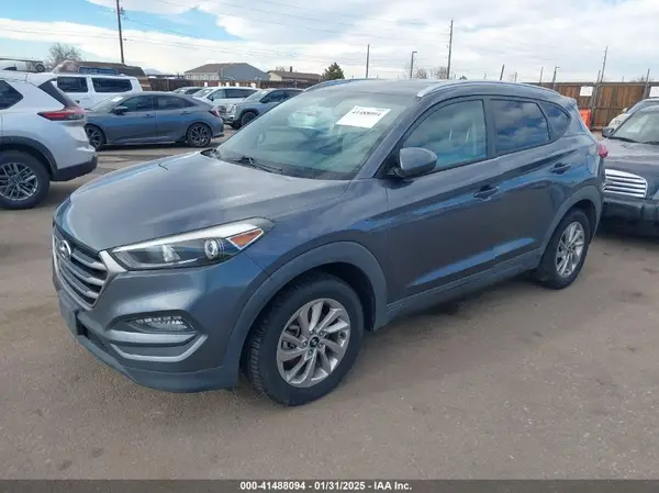 KM8J3CA43GU090127 2016 HYUNDAI TUCSON - Image 2