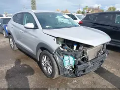 KM8J3CA43GU100459 2016 HYUNDAI TUCSON