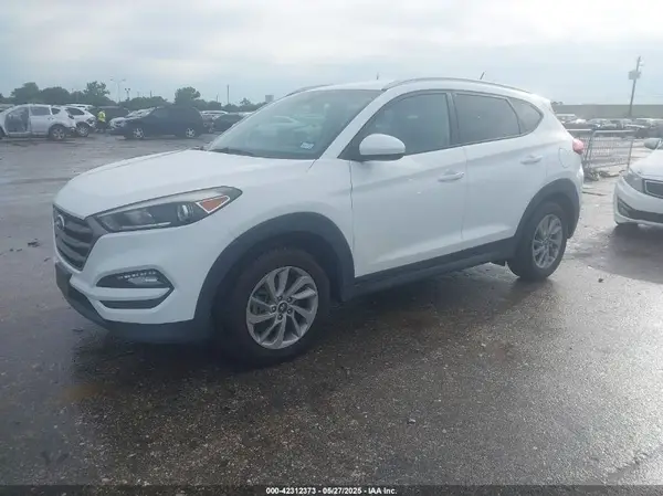 KM8J3CA43GU101384 2016 HYUNDAI TUCSON - Image 2