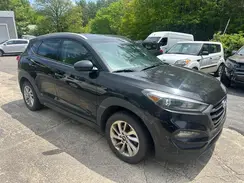 KM8J3CA43GU145854 2016 HYUNDAI TUCSON