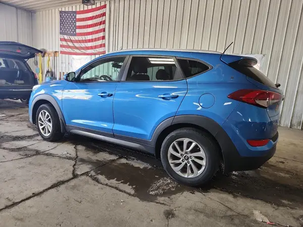 KM8J3CA43GU227275 2016 HYUNDAI TUCSON - Image 2