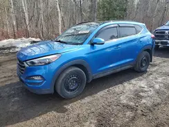 KM8J3CA43GU235070 2016 HYUNDAI TUCSON